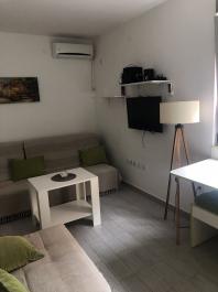Новая квартира-студия в новостройке в Будве