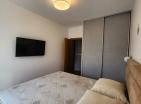 Потрясающая новая квартира с 2 спальнями площадью 58 м2 с видом на море в Будве