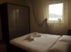 Квартира с двумя спальнями, кухней и гостиной в центре Тивата